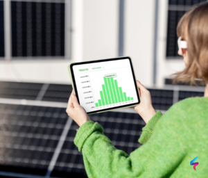 A property manager looking at an iPad to see energy consumption with solar panels in the background